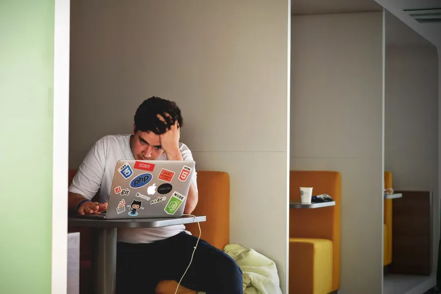 A man searching for a new job online